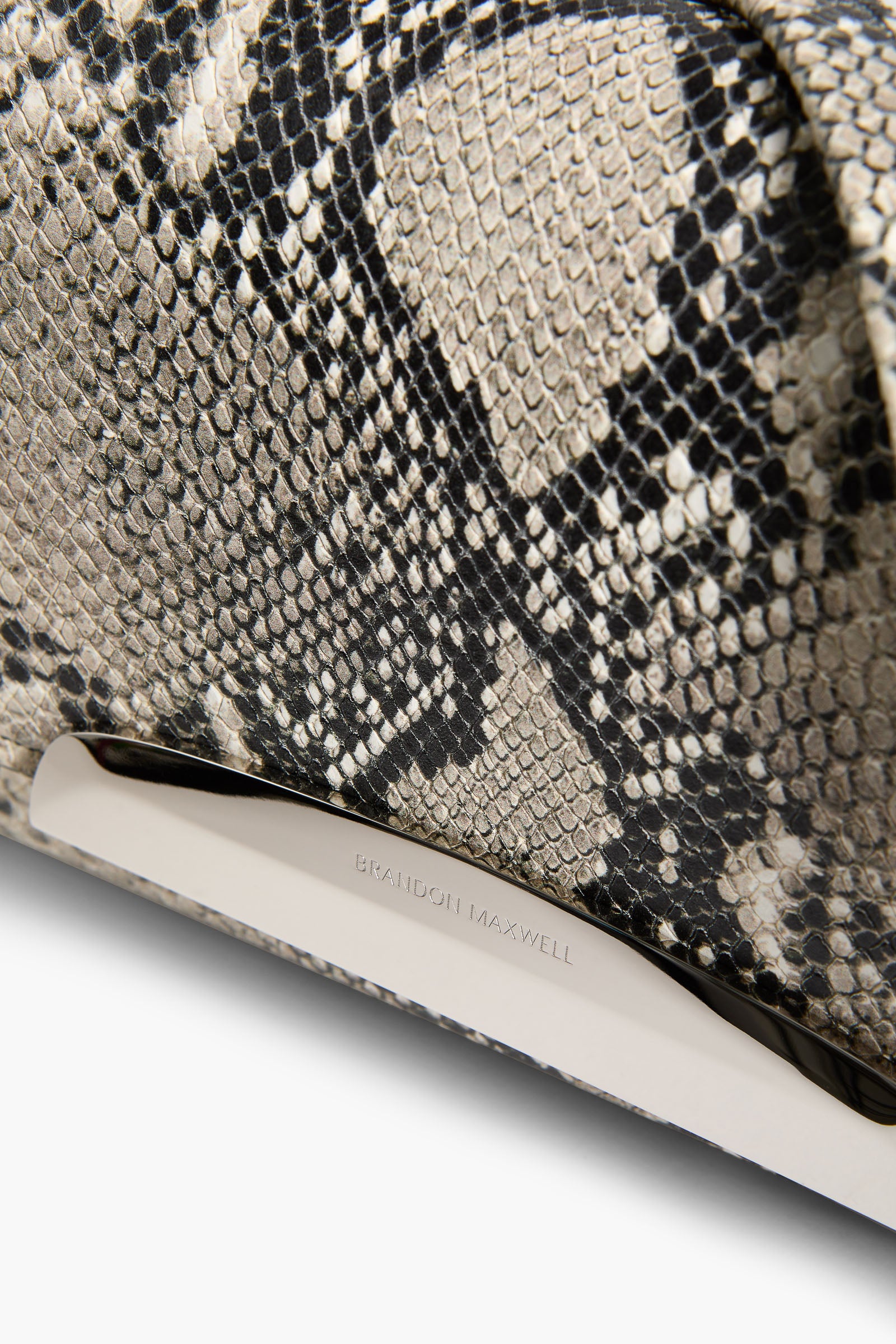 The Louise Pochette Bag in Black and White Embossed Python Leather