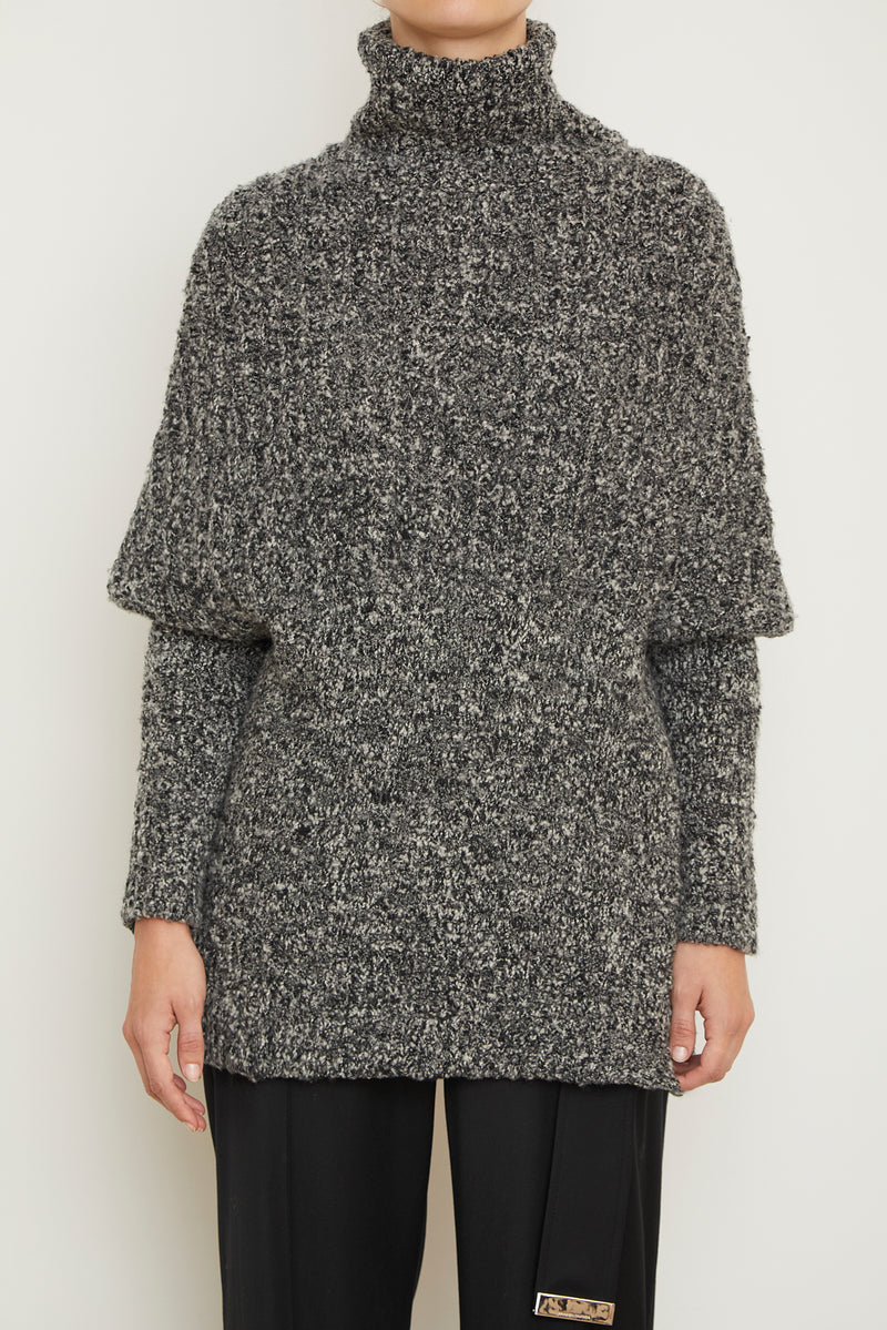 The Matea Cape Long Sleeve Turtleneck Sweater in Pepper