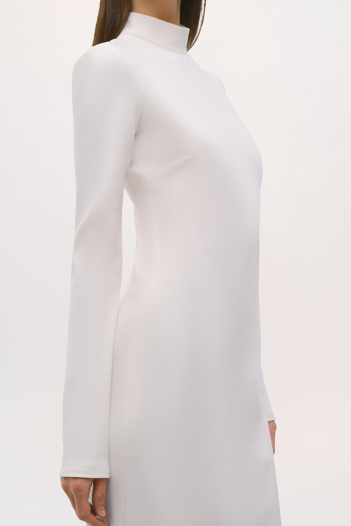 Close up side view of the Crosby Dress in Ivory.